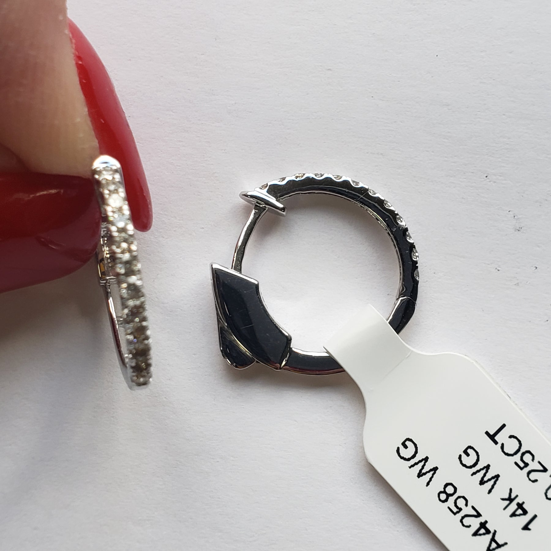 14kt white gold diamond half-way round hoop earrings with 0.25 cts tw 7261418913852