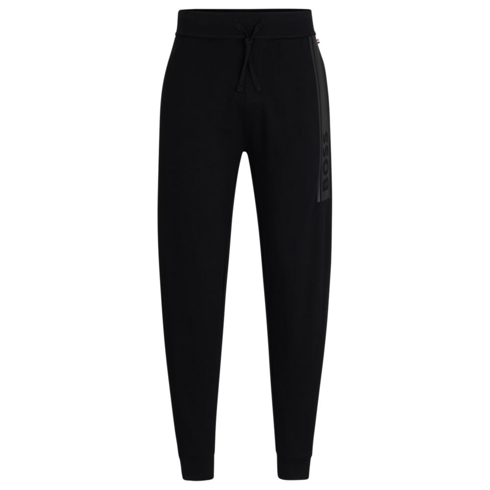 Cuffed tracksuit bottoms in French terry with logo print
