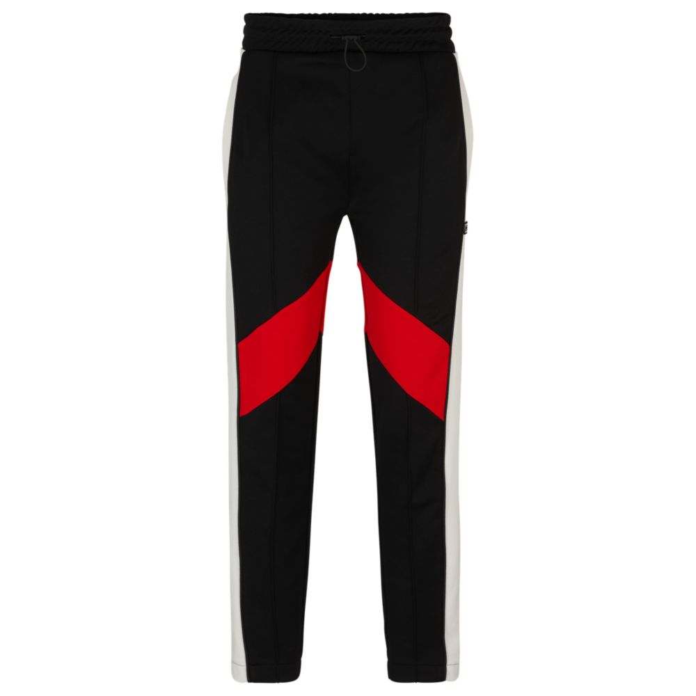Relaxed-fit tracksuit bottoms with color-blocking 7581190422588