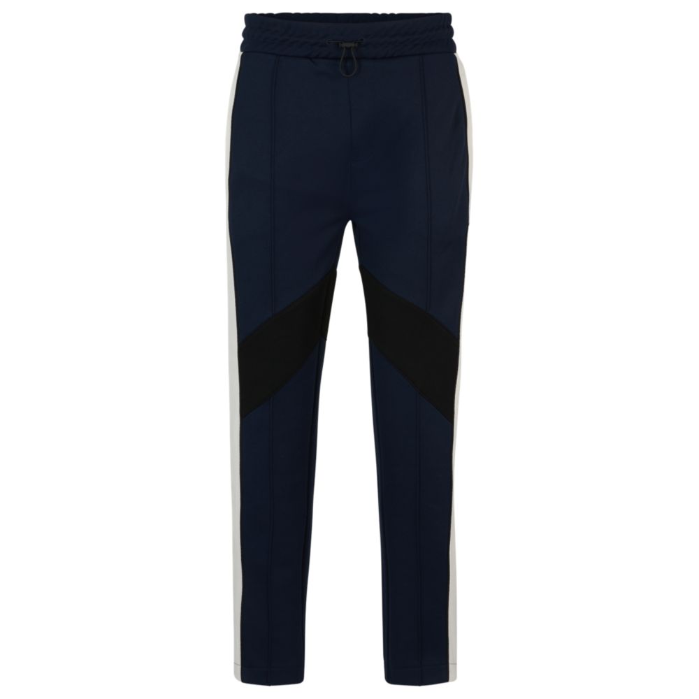 Relaxed-fit tracksuit bottoms with color-blocking